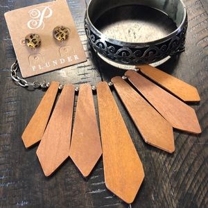 Necklace, bracelet, and earrings.